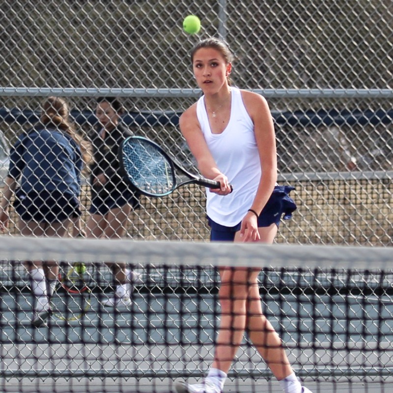 An Air Academy Girls Tennis player on the court